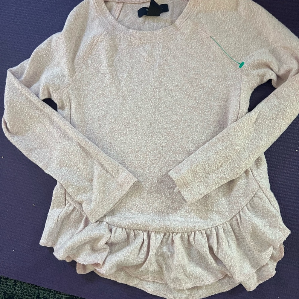 Soft pink top.